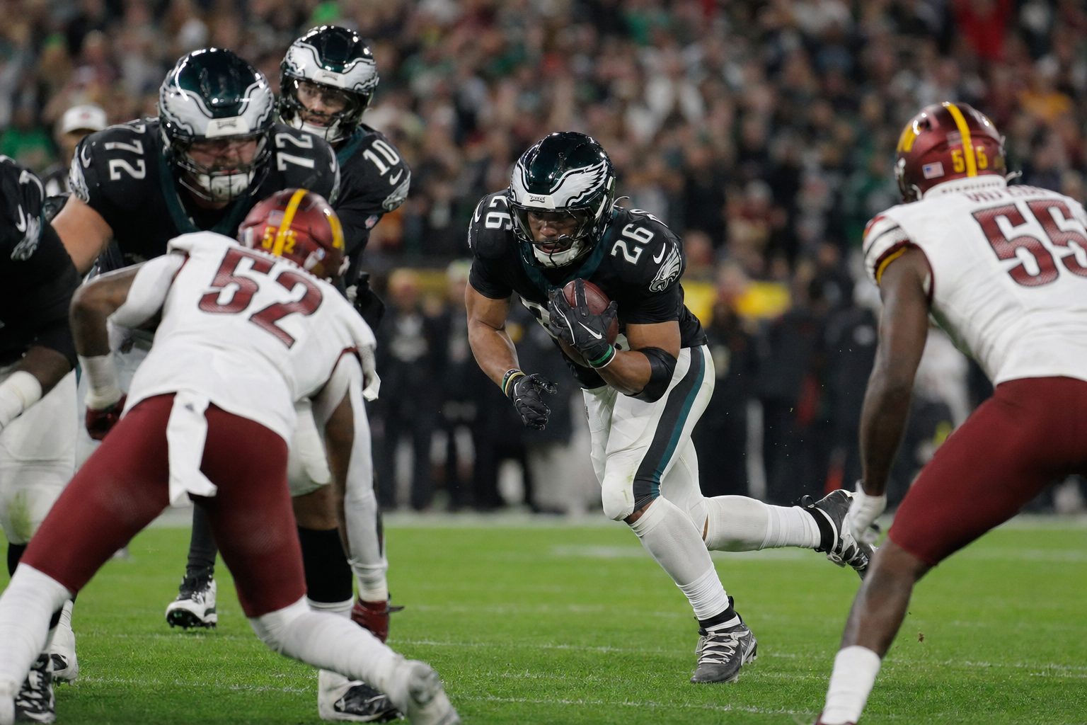 American football players on artificial turf — TapeGeeks turf tape for field sports