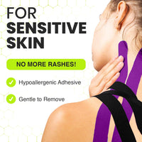 Woman applying TapeGeeks purple and black kinesiology tape on shoulder and neck, hypoallergenic for sensitive skin.