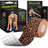 Leopard-print TapeGeeks kinesiology tape roll next to branded packaging, combining bold style with reliable muscle support and flexible movement.
