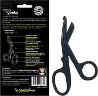 TapeGeeks medical scissors displayed beside retail packaging with highlighted features such as blunted ends, non-slip handles, fluoride-coated stainless steel blades, and built-in wire cutter.