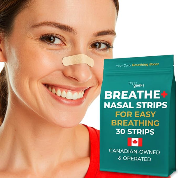 woman wearing a beige athletic nasal strip and holding tapegeeks breathe+ nasal strip packs for improved airflow and breathing support