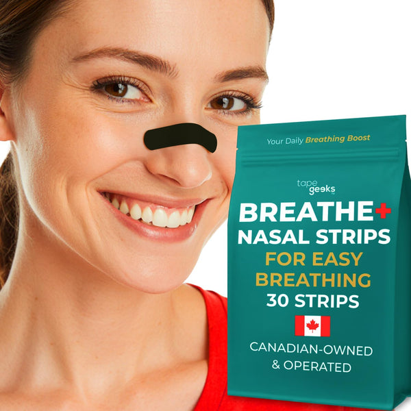 woman wearing a black athletic nasal strip and holding tapegeeks breathe+ nasal strip packs for improved airflow and breathing support