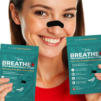 woman wearing a black athletic nasal strip and holding tapegeeks breathe+ nasal strip packs for improved airflow and breathing support