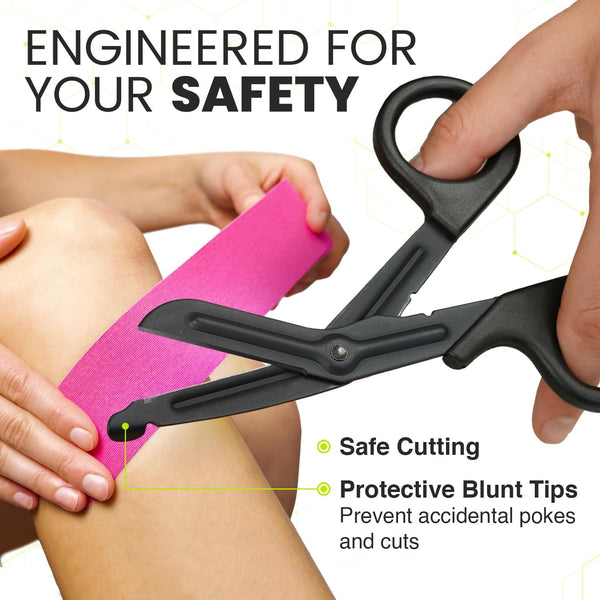 TapeGeeks medical scissors cutting a strip of kinesiology tape, demonstrating the safe cutting design and protective blunt tips that prevent accidental pokes and skin irritation.