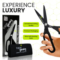 A hand holding TapeGeeks kinesiology scissors with packaging and microfiber cloths shown below, highlighting the bundle contents and premium cutting performance.