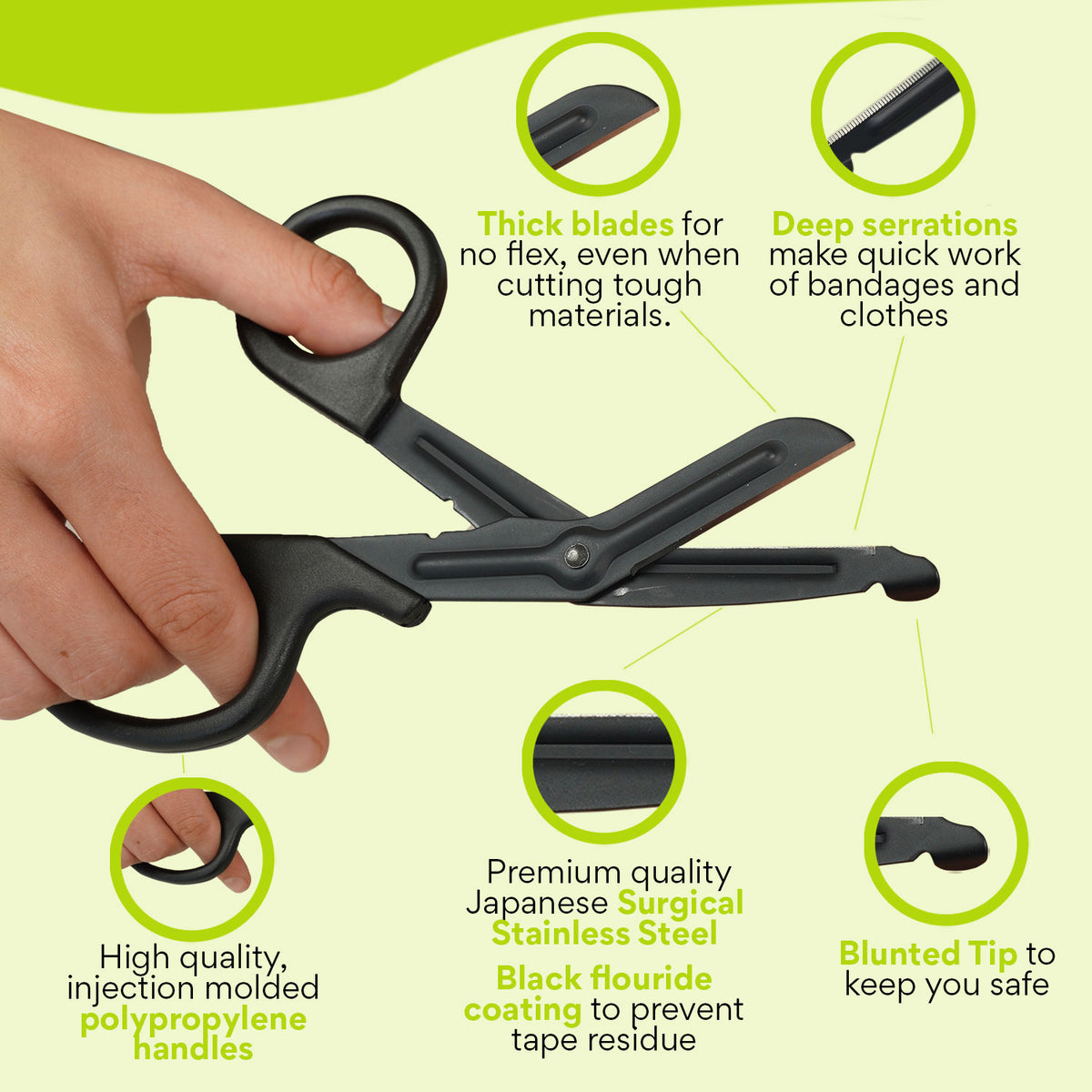 Close-up of TapeGeeks medical scissors showing thick blades, deep serrations, polypropylene handles, and a blunted safety tip to prevent skin injury.
