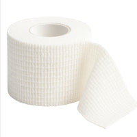 tapegeeks-weightlifting-tape-white-thumb-tape-hook-grip-lifting-protection
White roll of TapeGeeks weightlifting tape with a textured, flexible finish, shown unrolled to display its breathable cotton material used for thumb protection, hook grip support, and blister prevention during heavy lifting.