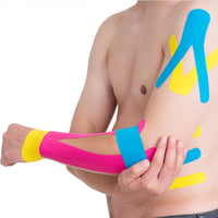 TapeGeeks kinesiology tape in pink, yellow, and blue applied to arm for joint and muscle support